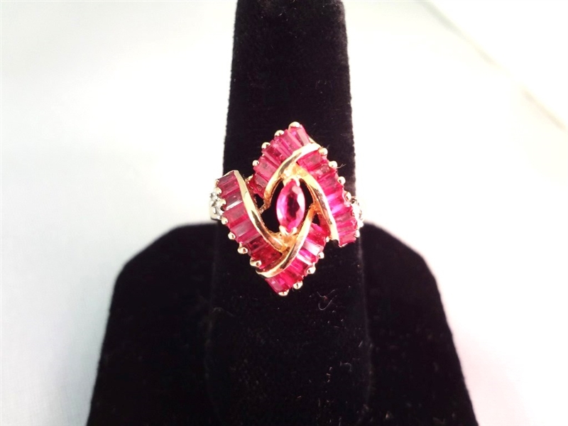 14K Gold Ring (1) Marquise Cut Ruby, (23) Ruby Baguettes, (4) Diamond Chips Ring Size 7.5