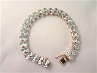 14K Gold Tennis Bracelet (52) Cushion Topaz Oval 6x4mm (26) carats: