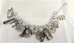 Monet Sterling Silver Charm Bracelet (14) Charms