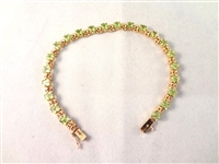 14K Gold Tennis Bracelet (22) Princess Cut Peridots 7" Long