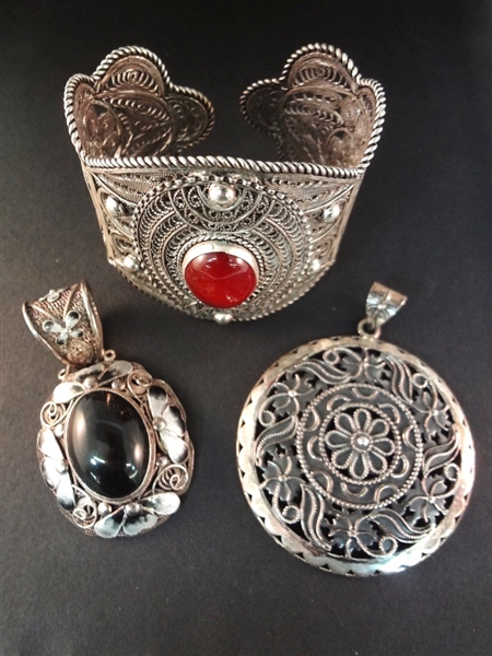 (3) Sterling Silver High Filigree Detail Jewelry: Cuff Bracelet, (2) Pendants