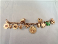 14k Gold Charm Bracelet with 12 14k gold charms