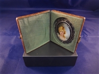 Hand Painted Miniature Porcelain set in Sterling Inside Tin Type Leather Tooled Case