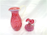 (2) Fenton Glass Cranberry Opalescent Pitchers: Herringbone and Swirl