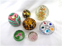 (7) Unsigned Glass Paperweights: caned, floral, others