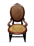 Victorian Walnut Sewing Rocker with Cane Seat and Back