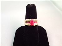 14K Gold Ring (1) Oval Ruby 6x4mm, (8) Ruby Baguettes Ring Size 6.75