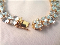 14K Gold Tennis Bracelet (52) Cushion Topaz Oval 6x4mm (26) carats