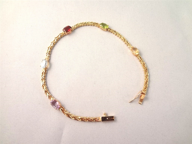 14K Gold Multi Gemstone Tennis Bracelet: (5) Oval Garnet, Amethyst, Peridot, Topaz, Citrine