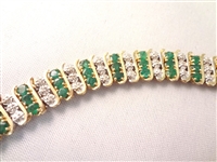 14K Gold Emerald and Diamond tennis Bracelet (69) Round Emerald 2.6mm (69) Diamonds