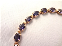 14K Gold Tennis Bracelet (20) Oval Iolites 7x4mm (10) carats