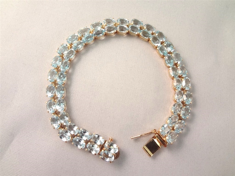14K Gold Tennis Bracelet (52) Cushion Topaz Oval 6x4mm (26) carats:
