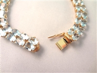 14K Gold Tennis Bracelet (52) Cushion Topaz Oval 6x4mm (26) carats: