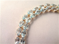 14K Gold Tennis Bracelet (52) Cushion Topaz Oval 6x4mm (26) carats:
