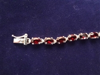 (3) Sterling Silver and Garnet Tennis Bracelets