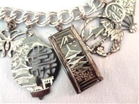 Monet Sterling Silver Charm Bracelet (14) Charms