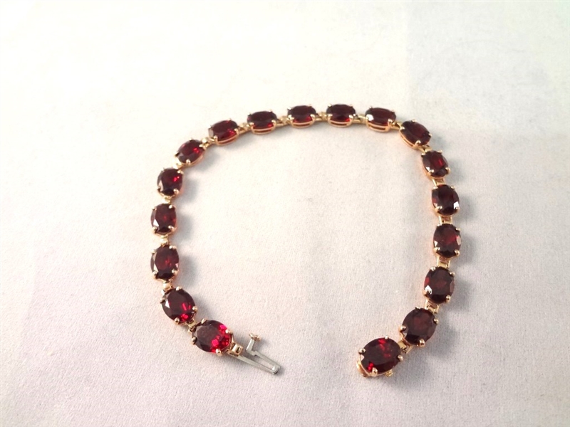 14K Gold Tennis Bracelet (18) Oval Cut Garnets 7.5" Long