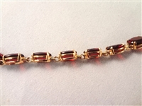 14K Gold Tennis Bracelet (18) Oval Cut Garnets 7.5 Long