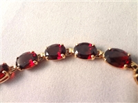14K Gold Tennis Bracelet (18) Oval Cut Garnets 7.5 Long