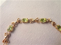 14K Gold Tennis Bracelet (10) Oval Cut Peridot 7 Long