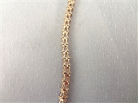 14K Gold Tennis Bracelet with (52) Triangle Cut Purple Stones 7.25 Long