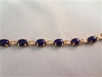 14K Gold and Lapis Lazuli Jewelry: (1) Necklace, (1) Ring, (2) Bracelets