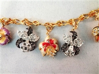 (3) Nolan Miller Jewelry Group: Charm Bracelet, Cala Lily Bangle, Parrot Bangle