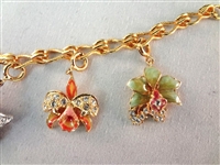 (3) Nolan Miller Jewelry Group: Charm Bracelet, Cala Lily Bangle, Parrot Bangle