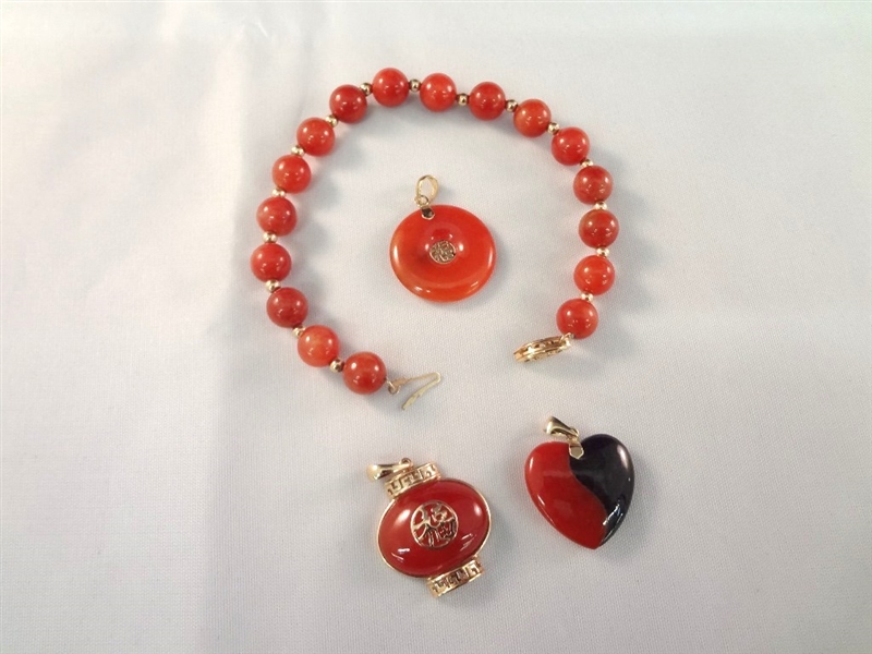 14K Gold and Red Jade Jewelry Group: (1) Bracelet, (3) Pendants