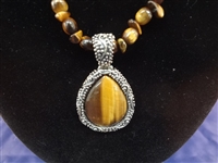 Sterling Silver and Tiger Eye Matching Jewelry Group: Necklace, Pendant, Bracelet, and Ring