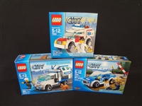 (3) LEGO Unopened Sets: 4436 Patrol Car, 7902 Doctors Car, 7285 Police Dog Unit