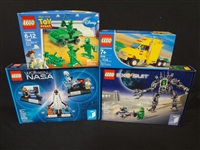 (4) LEGO Unopened Sets: 21109 Exosuit, 21312 Woman of NASA, 10156 LEGO Truck, 7595 Toy Story