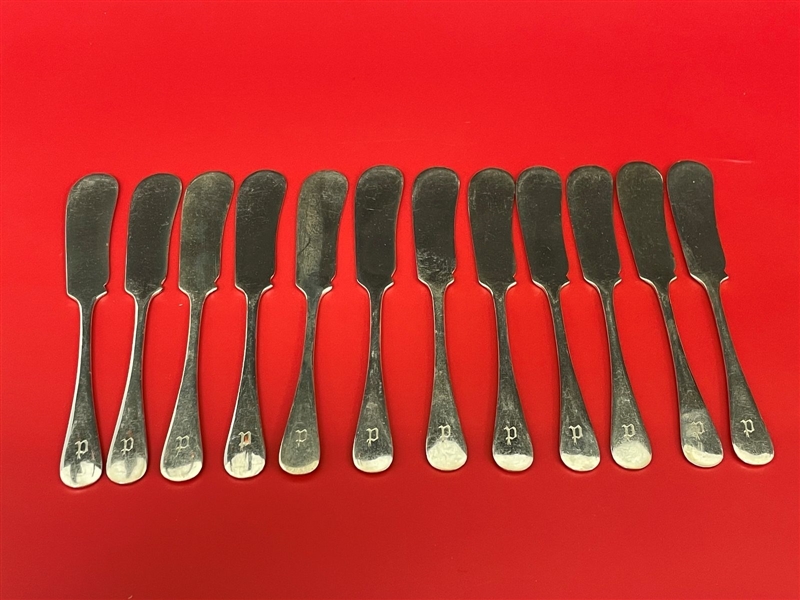 (12) Mappin and Webb Sterling Silver Spreaders 