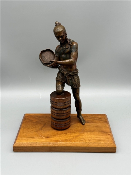 Bronze Sculpture of a Man on Wooden Base