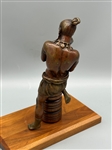 Bronze Sculpture of a Man on Wooden Base