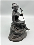 Cast Iron Figurine of Woman With Shepherds Hook on Rock