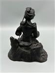Cast Iron Figurine of Woman With Shepherds Hook on Rock
