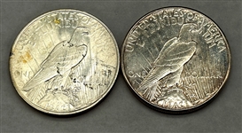 (2) Peace Silver Dollars