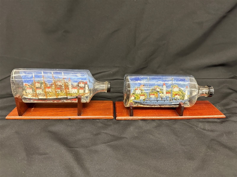 (2) Hand Made Painted Ships in Bottles on Stands