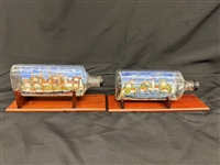 (2) Hand Made Painted Ships in Bottles on Stands