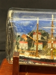 (2) Hand Made Painted Ships in Bottles on Stands