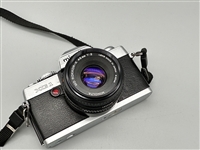 (L) Minotla & Konica 35mm SLR Cameras