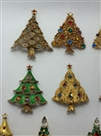 (11) Signed Christmas Tree Brooches