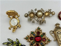 (12) Group of Costume Brooches; Hattie Carnegie, Others
