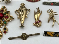 (12) Group of Costume Brooches; Hattie Carnegie, Others