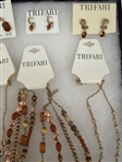 (12) Trifari Jewelry on Card: Earrings, Brooch, Necklaces