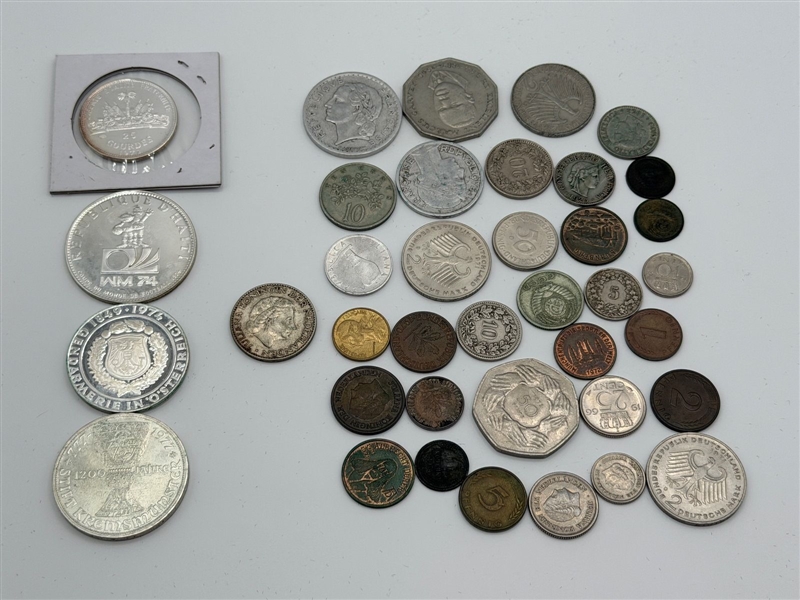 (39) Group of Foreign Coins: Including Silver From Haiti, Austria, Netherlands