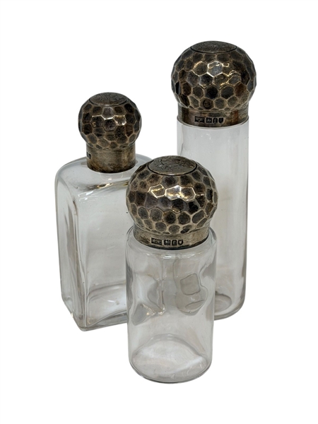 (3) 1901 Mappin and Webb Sterling Silver Hammered Top Glass Bottles