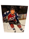 Group of Signed Hockey Color Photos and Hockey Pucks Including (2) Gordie Howe