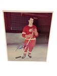 Group of Signed Hockey Color Photos and Hockey Pucks Including (2) Gordie Howe